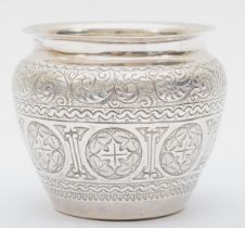 A Victorian silver sugar bowl, Birmingham 1892, with embossed decoration, diameter 7.5cm, 75gm