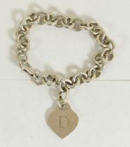 Tiffany & Co., a silver curb link bracelet with heart drop, engraved D, 36gm