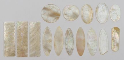 Fifteen Georgian mother of pearl gaming tokens.