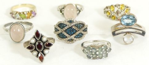 Eight silver and gem set rings, J - R, 36gm