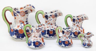 A set of six contemporary "Masons Ironware" graduated jugs, decorated with sprays of flowers,