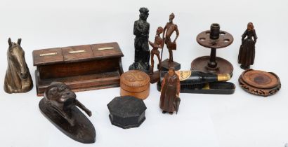 Various late 19th/early 20th century carved wooden figures, together with a three section oak ink