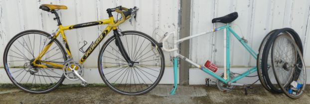 A gents specialised road racing bicycle together with a Raleigh Equipe racing bicycle