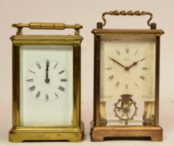 A German 8 day brass carriage clock, the movement stamped Schatz, together with an unnamed