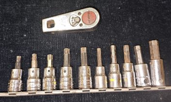 A Snap-on ratchet, F734, five Snap-on star sockets and five other sockets