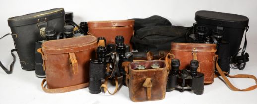Seven pairs of cased binoculars, together with two draw telescopes and a spotting scope & tripod.