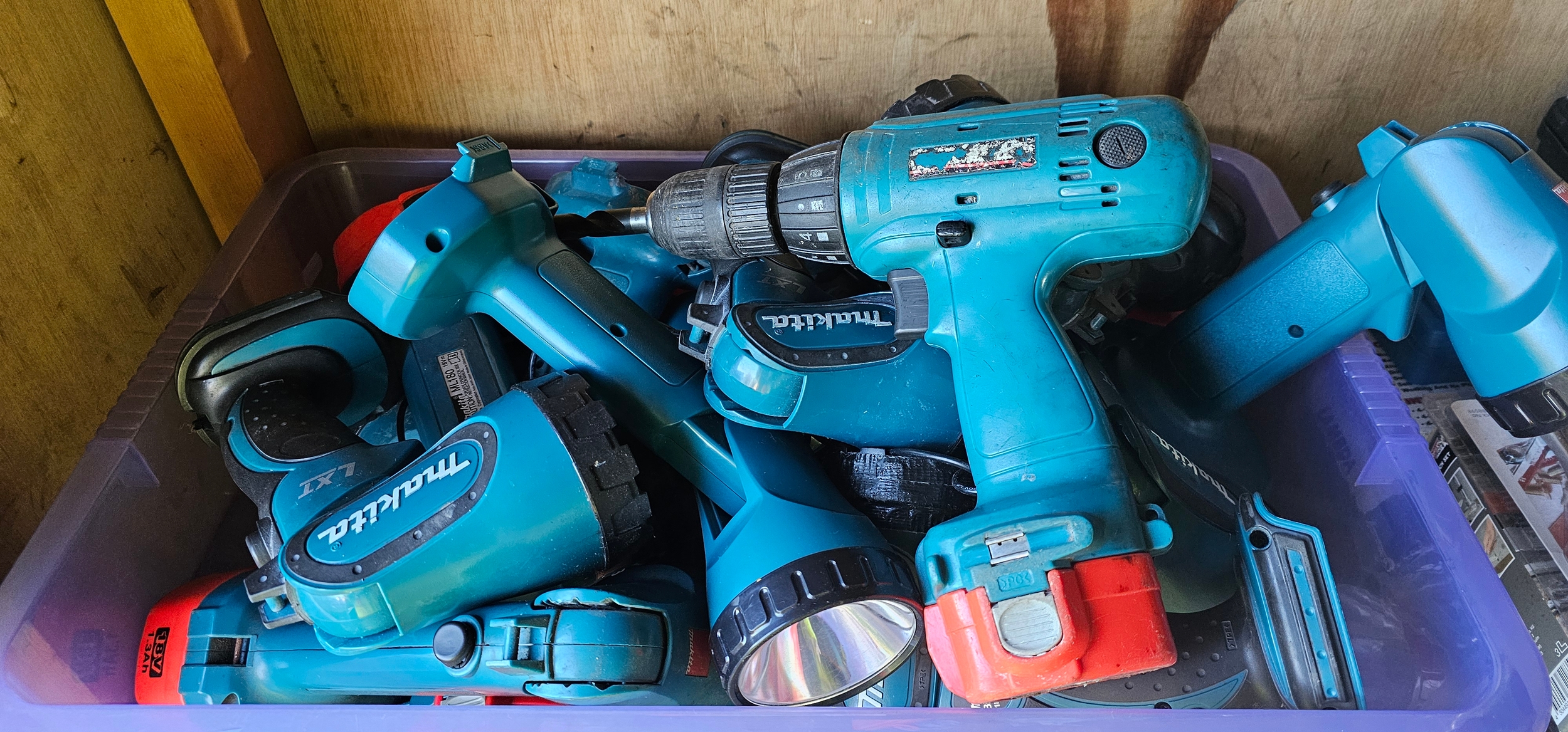A quantity of Makita cordless torches and a drill, batteries unknown condition