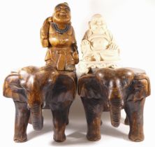 A pair of contemporary carved elephant foot stools, 30cm high together with a carved hardwood Buddha