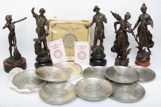 An early 20th century bronze figurine of a female archer, together with four spelter figurines, 35cm