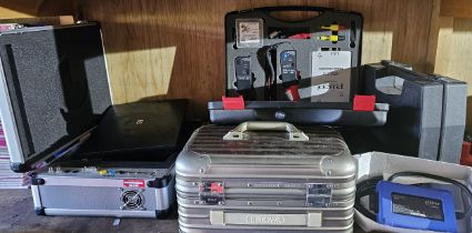 A Pico automotive diagnostics test kit, another partial kit, and a Tech Doc test kit, all untested