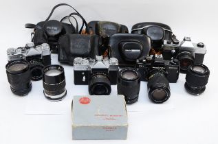 A collection of 35mm cameras and lenses, makers to include Praktica BC 1, Zenit-E, Rank Mamiya,