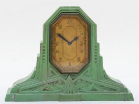The Lux Clock Co., USA, an unusual Art Deco pale green painted mantel clock with Savings Bank to the