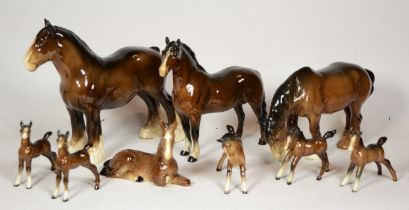 A collection of nine Beswick horses to include mid brown colourway, chestnut brown, various sizes,