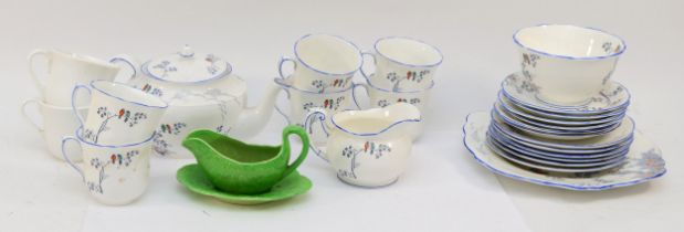 An early 20th century Foley China pattern tea set, transferred decorated with birds in a tree