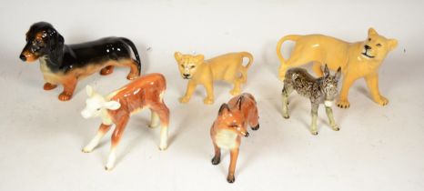 A collection of six pottery animal models, makers to include Beswick and Goebel. (6)