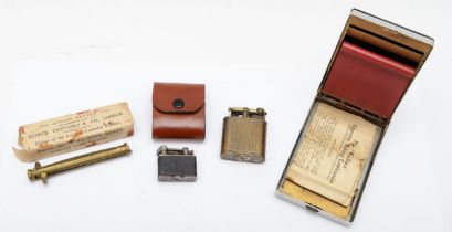 A Dunhill Unique Sports petrol lighter, a small Dunhill lighter, leather case and two cigarette