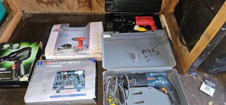 A Site 110V drill, a Bosch 110V drill and three other tools