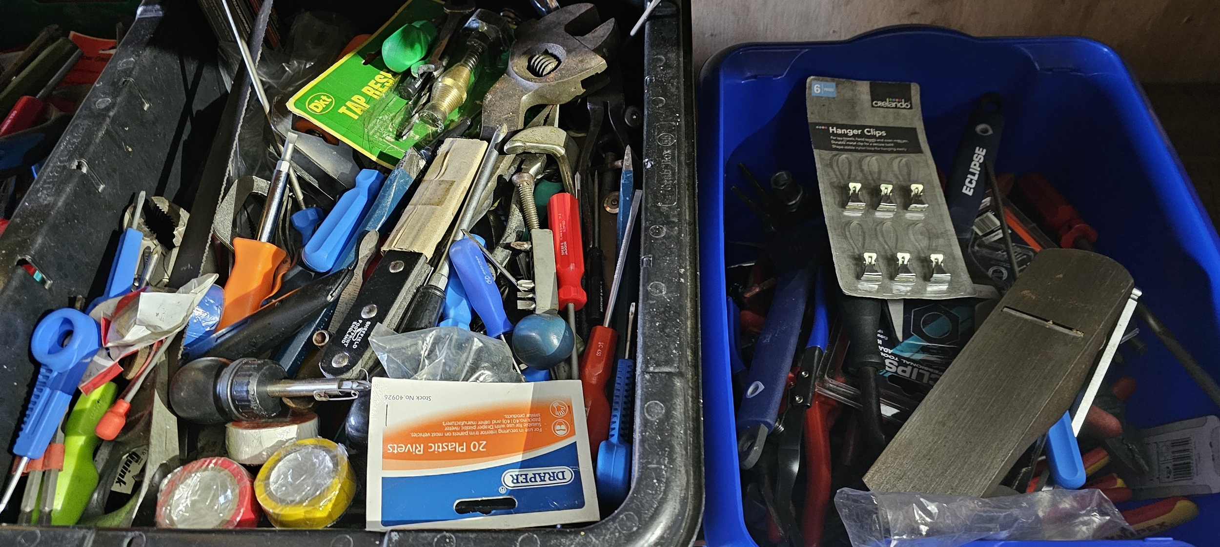Two containers of tools