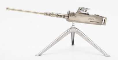 A novelty petrol lighter in the form of a Browning machine gun, 30cm