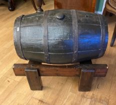 A decorative steel round Keg on a solid wood stand, H60 W73cm