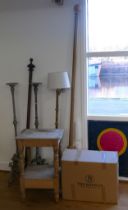 A pair of cast metal candle stands, 131cm, a stripped pine wash stand, two curtain poles, 224cm, and