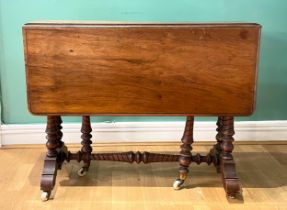 A 19th century walnut Sutherland drop leaf gateleg table, raised on turned supports and turned