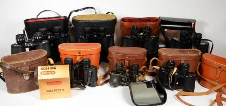 A collection of twelve pairs of binoculars, circa mid 20th century and later, various sizes and
