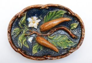 A late 19th century majolica dish with pepper plant decoration, by Johann Maresh, impressed marks to