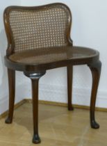 A Victorian mahogany kidney seat backed stool, 68cm.