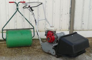 A Honda petrol driven lawn mower, model G100 2.2HP electronic ignition, together with a garden