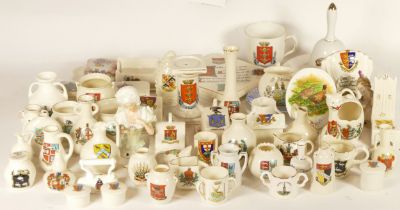 A substantial collection of souvenir wares, makers to include Goss and others, including butter