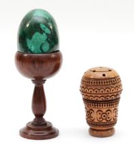 A malachite carved egg, raised on a fitted mahogany stand, 11cm high together with a 19th century