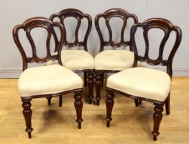 A set of four 19th century Irish Chippendale style mahogany framed dining chairs, with recently