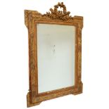 A 19th century gilt painted hanging bevel edged wall mirror, with carved laurel wreath and