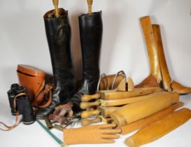 A group of horse riding equipment to include boot lasts, black leather riding boots, 11B, and a