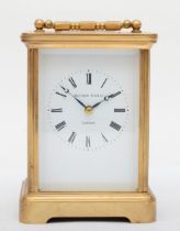 Matthew Norman, an English brass striking carriage clock, the signed movement striking the half