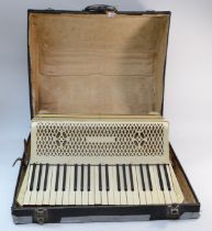A 20th century cased 120 button piano accordion, 47cm long