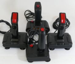 Four computer joysticks for 8 bit machines, to include QuickShot, Archer, and Gum Shot. (4) Sold