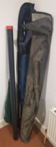 A Sterling Chevron glass fibre course fishing rod, together with a Total three piece fishing rod and