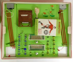 Subbuteo; a boxed World Cup edition football games, complete with accessories.