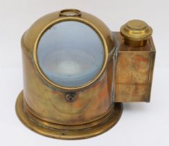A Sestral gimballed compass, mounted in a brass binnacle, with light source,