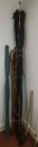 A collection of twelve mid 20th century and later split cane and glass fibre course fishing rods,