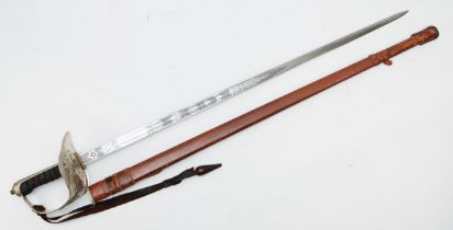 A George V 1897 pattern infantry Officers Sword, the blade with etched crowned Royal Cipher and Arms