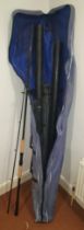 A Maver Strongarm 1250 fishing pole, together with a Quick Silver carp rod, a Sonic rod, a brolly