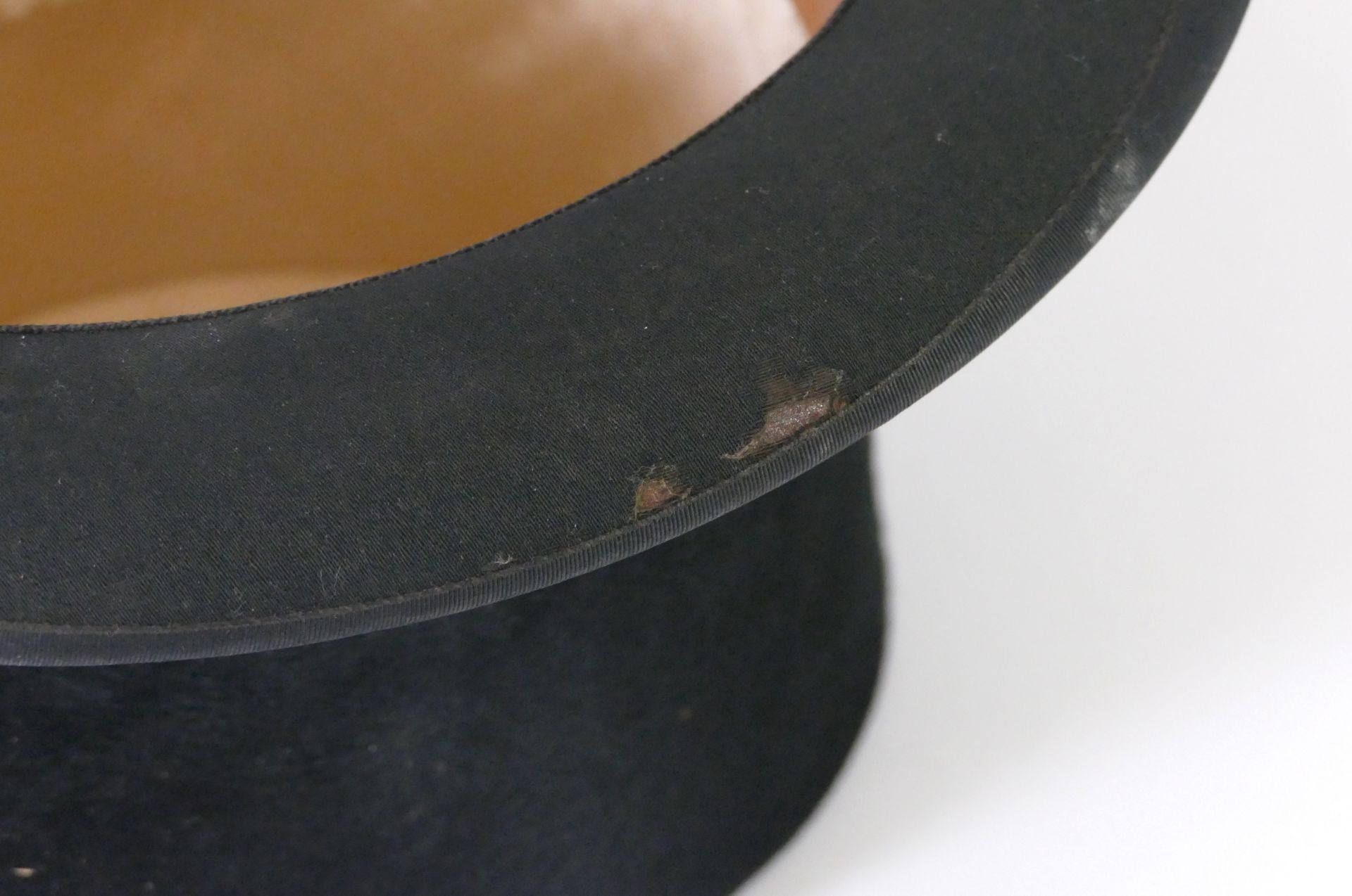 A 20th century black silk gentleman's top hat in brown leather hat box, 58cm internal circumference. - Image 5 of 7