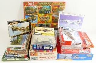 A group of model kits to include two Williams Bros Inc 1:32 aviation kits, 32-135, 32-711, and other