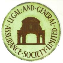 A 20th century Legal & General Assurance Society Ltd circular glass advertising panel, with