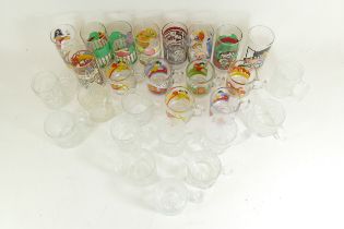 A collection of McDonalds collector glass mugs/tankards, to include sets of; The Flintstones, Batman