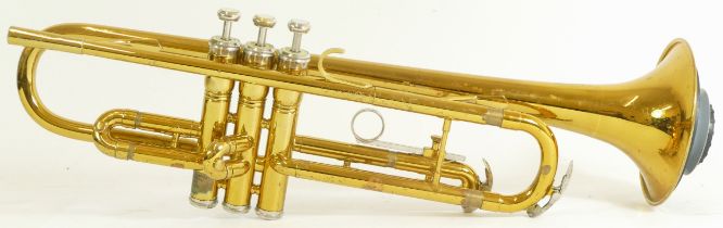 A contemporary King brass three button trumpet, in fitted case