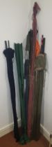 A collection of ten mid 20th century and later split cane and fibre course fishing rods, makers to